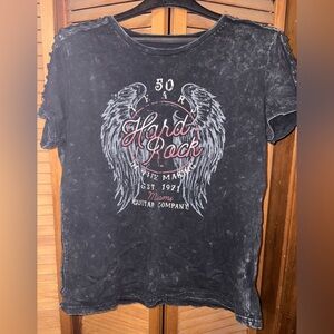 Hard Rock Cafe shirt.